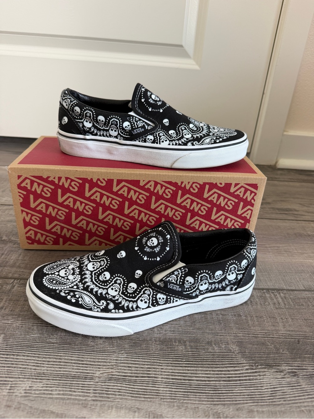 Vans Women’s Black & White Bandana/Skull Slip-On Sneakers